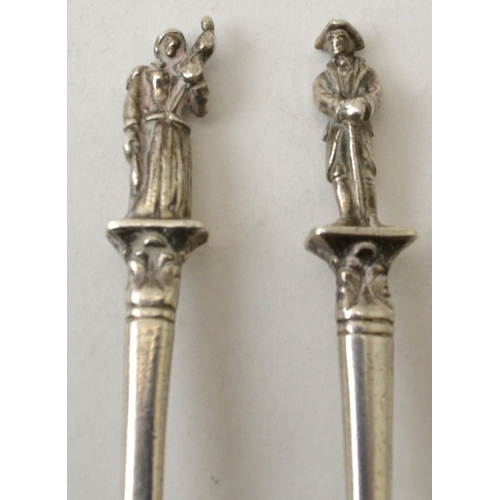 135 - Two Tiffany and Co silver spoons, having cast figure terminals, the figures in 18th century costume,... 