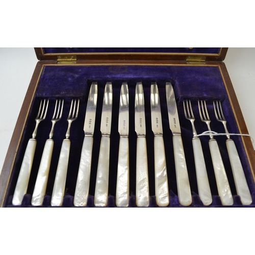 140 - Allen & Darwin, An Edwardian dessert set of silver bladed and tine knives & forks for twelve place s... 