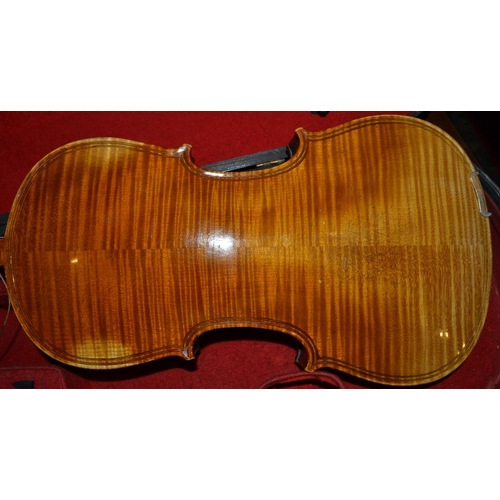 188 - A violin - ,Giovan Paolo Maggini  label inside ! with bow in a hard wooden case