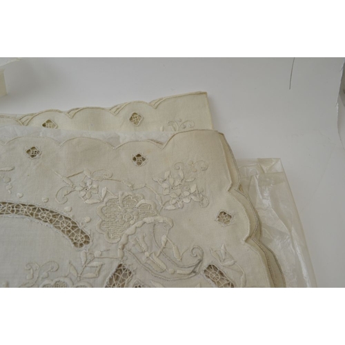 19 - A collection of embroidery Anglaise placemats, various shapes & sizes