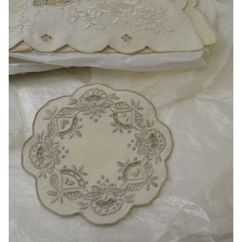 19 - A collection of embroidery Anglaise placemats, various shapes & sizes