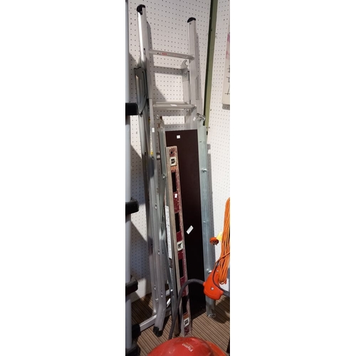 246 - A set of aluminium folding step ladders with platform and a spirit level