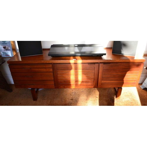 313 - A mid to late 20th century teak sideboard, fitted drawers & cupboards