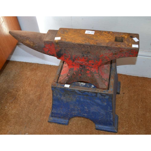 314 - A anvil on metal stand, the anvil, 57cm long, overall 54cm high (incl. stand)