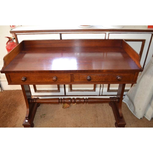 317 - William IV mahogany writing table having two drawers on a classical base