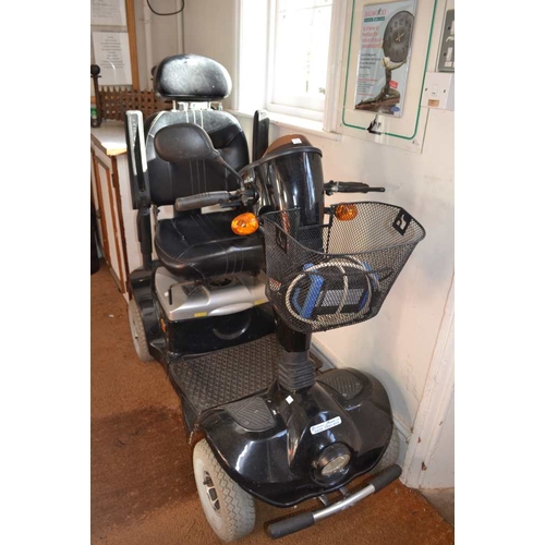 319 - A Scooter Mart Lagonda mobility scooter currently in working order but in need of TLC. Charger and k... 