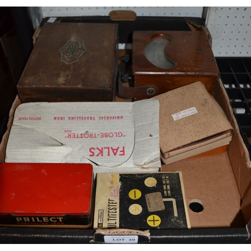 39 - Vintage domestic collectables to include volt meters and travel irons