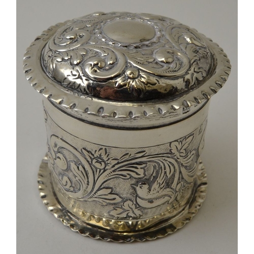 11 - Hunt & Roskell, A Victorian silver cylindrical box and cover, with embossed decoration, London 1891,... 