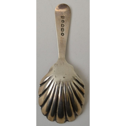 18 - Josiah Williams & Co. A Victorian silver caddy spoon, with shell bowl, Exeter 1876, weight: 12g