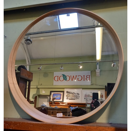 216 - A modern large circular wood framed mirror