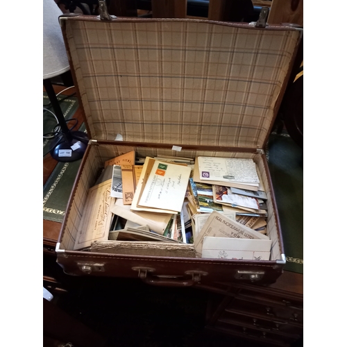 220 - A small evacuee's suitcase containing a selection of postcards