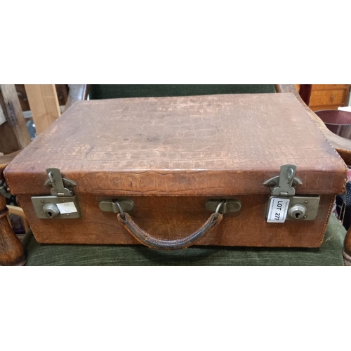 277 - A vintage leather vanity case