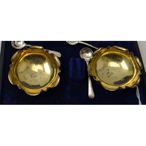 30 - William Light, A cased set of four Victorian silver salts, with gilded interiors, Birmingham 1897, t... 