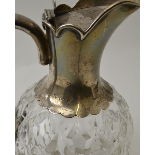 6 - Goldsmiths & Silversmiths Co. A cut glass claret jug with silver mounts, Birmingham 1927, 21cm high