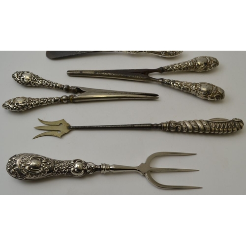 8 - Seven various silver handled items bread fork, pickle fork, shoe horn, glove stretchers, etc.