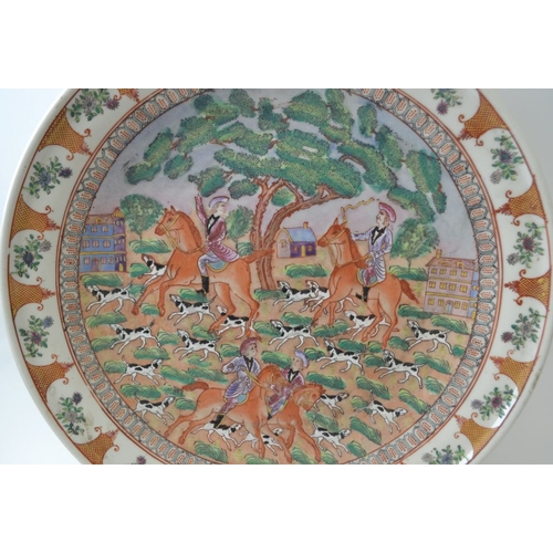 80 - A Chinese ceramic charger, decorated with a European hunting scene, intended for the export market, ... 