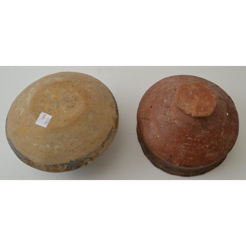 82 - Two Chinese pottery vessels, considered to be Neolithic, both with painted decoration, one applied w... 