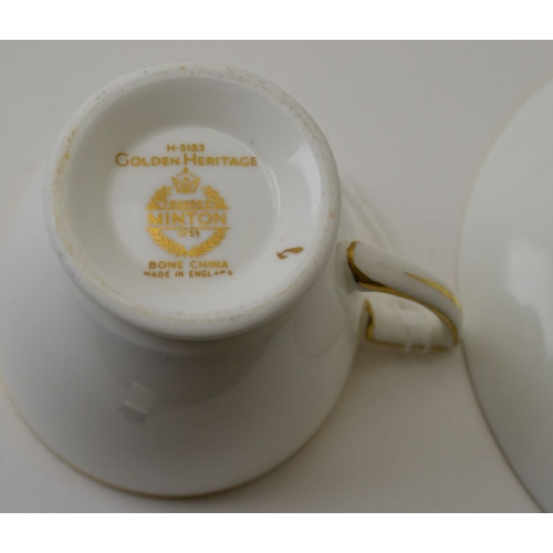 85 - A set of six Minton bone china coffee cups and saucers, 