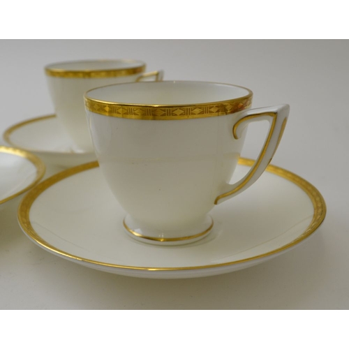 85 - A set of six Minton bone china coffee cups and saucers, 