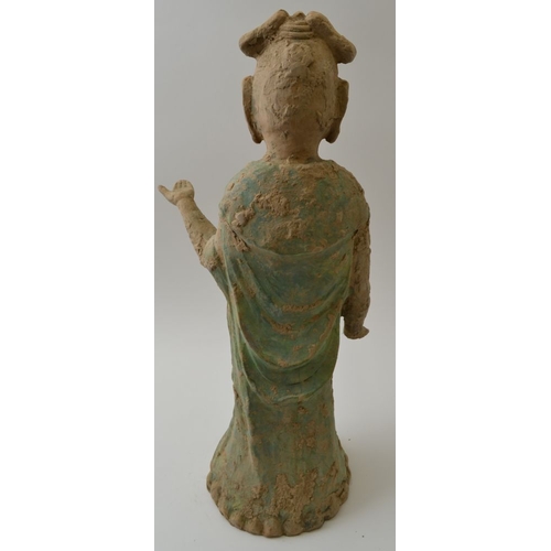 90 - A Chinese earthenware Sung style Guanyin figure, with remains of painted decoration, 45cm high