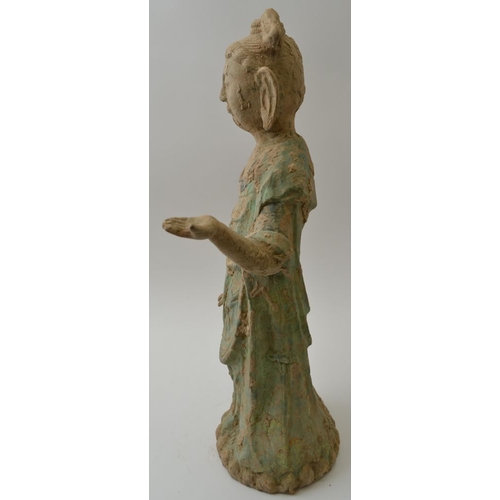 90 - A Chinese earthenware Sung style Guanyin figure, with remains of painted decoration, 45cm high