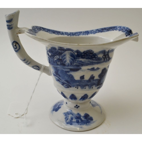 92 - A Chinese porcelain, helmet shaped creamer, blue on white landscape decoration, possibly Qianlong, 1... 