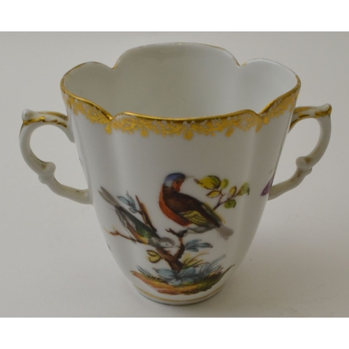 98 - A German porcelain two handled cup, hand painted bird and butterfly decoration, monogrammed for Augu... 