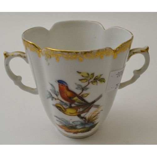 98 - A German porcelain two handled cup, hand painted bird and butterfly decoration, monogrammed for Augu... 