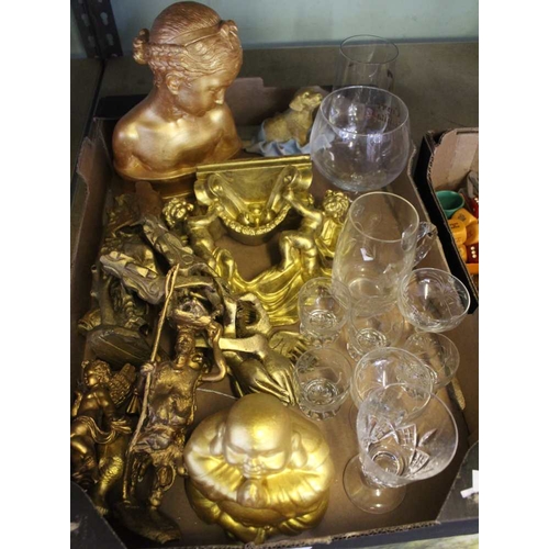 11 - A collection of gilded ornaments includes a Buddha and some glassware