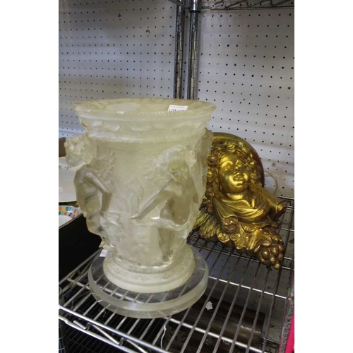 145 - A gilt 'putto head' wall bracket and an ornate perspex putti vase table lamp