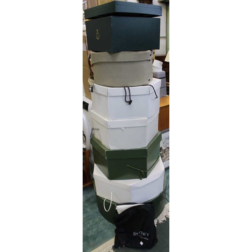 236 - A quantity of branded hat boxes, with hats and an 'Osprey' handbag