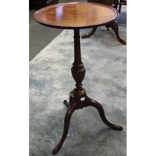 38 - Quality mahogany wine table on fluted baluster column