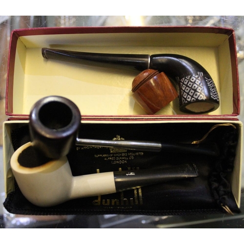 5 - Various pipes, pipe boxes and cigar boxes with a few cigars.