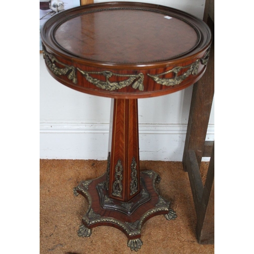 124 - A pair French Empire design kingwood and brass mounted lamp tables with parquetry tops sat on six br... 