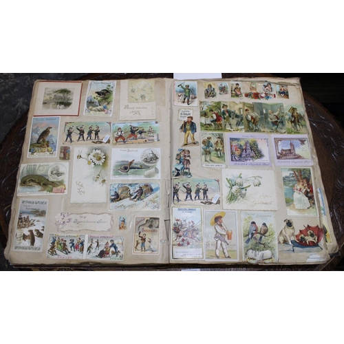 145 - A large late Victorian scrap album mainly of French scraps and other loose to the rear