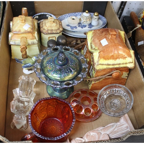 217 - A box assortment of glass and china wares, includes pottery cottage ware, teapot and a biscuit barre... 