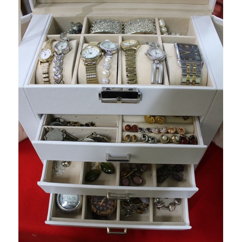 285 - A white jewellery box containing costume jewellery and watches