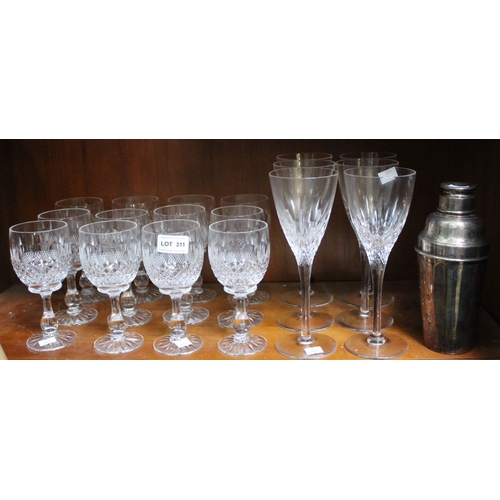 311 - A set of 12 stemmed wine glasses with a set 6 hock glasses and a plated cocktail shaker