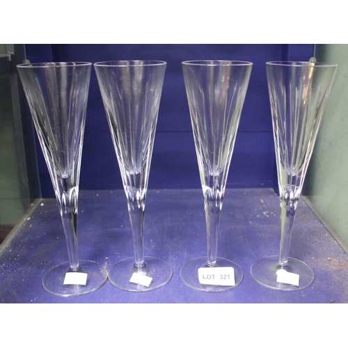 321 - A set of four Royal Doulton cut glass champagne flutes