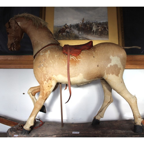 322 - Late 19th century hide covered child's horse on rocking stand