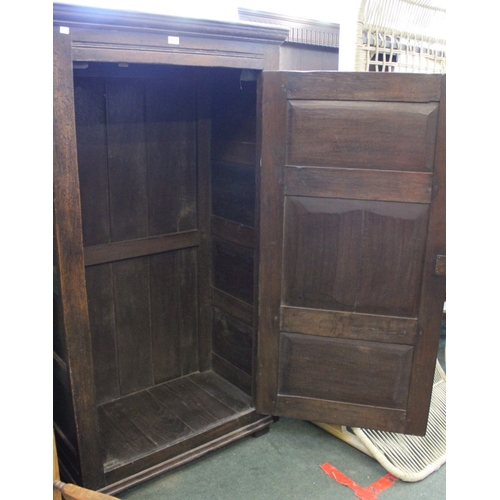 37 - A 17th century design oak hall cupboard 