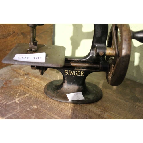 101 - A miniature hand cranked Singer sewing machine