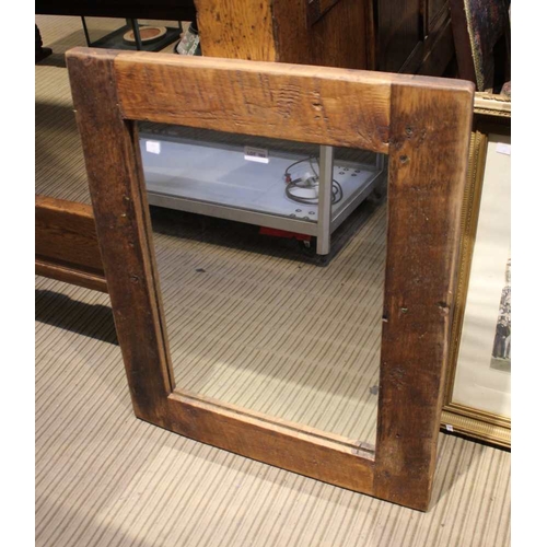 103 - A rustic framed rectangular wall mirror