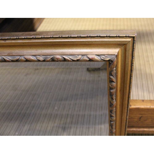 105 - A large bevel edged rectangular gilt frame wall mirror