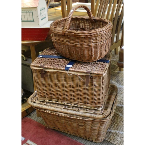 106 - Two wicker storage baskets with a traditional wicker shopping basket