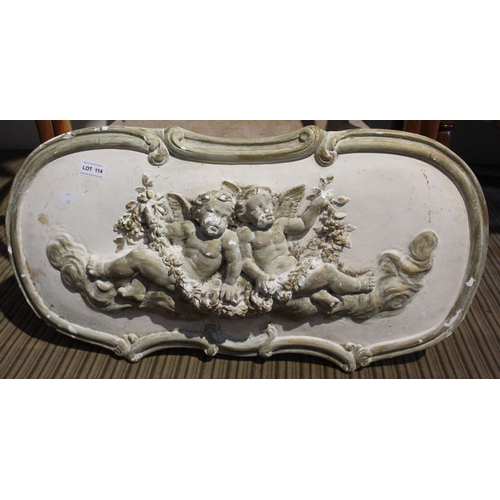 114 - A plaster wall hanging freeze of a pair of cherubs