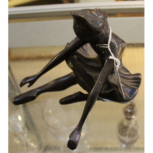 144 - A 20th century patinated bronze ballerina, 15cm high