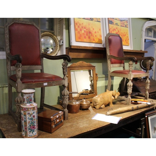 179 - A set of six carved oak chairs with red leather backs and seats to include two carvers