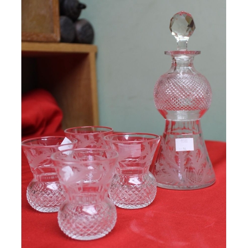 204 - A Scottish crystal glass Whisky decanter and set of four glasses, cut and etched thistle design