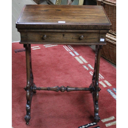 241 - A 19th century rosewood needlework table, the hinged cover opens and rotates to reveal a chess board... 